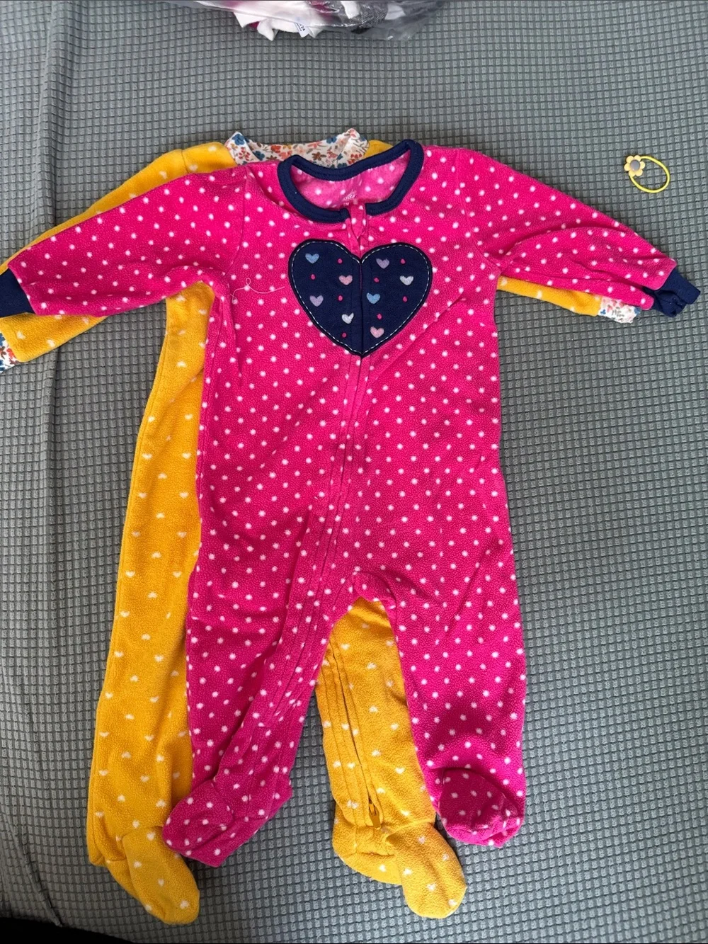 Baby Girls' 4 One-Piece Footed onesie size 6-9M.